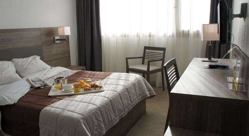 Kyriad Lyon Est - Genas Eurexpo Habitación foto